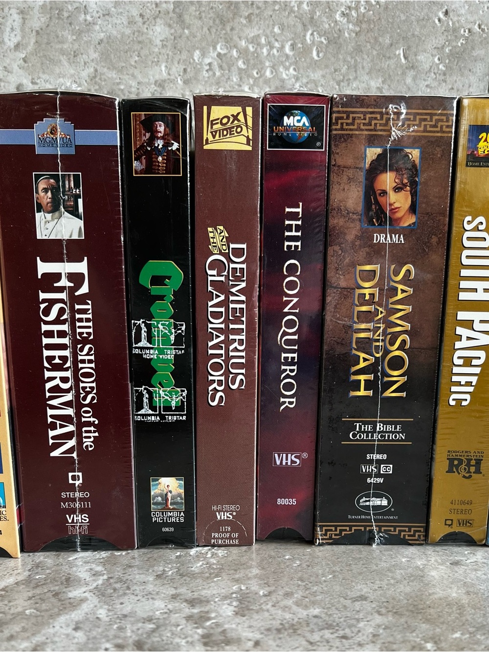 Source Unknown VHS Collection Spine - Maroon, Brown, Black